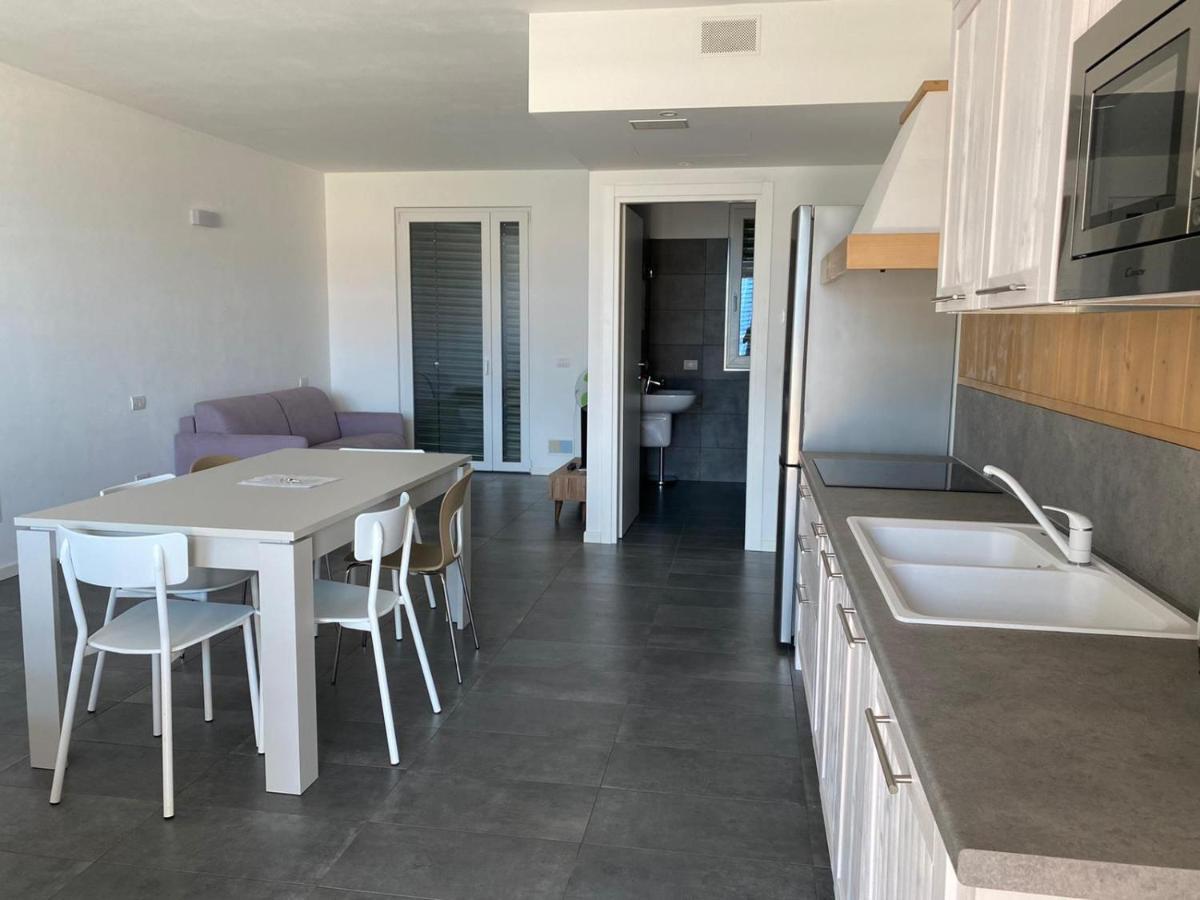 Modern Apartments Lake View With Pool Musso Exterior photo